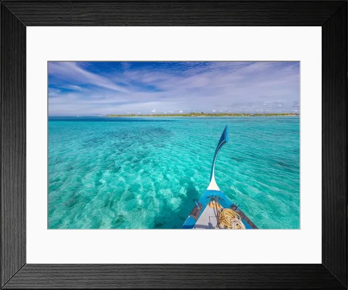 Framed Print : Traditional Maldivian boat Dhoni with amazing tropical island background view. Nature paradise beach, open sea view, seascape in Maldives, luxury Framed Print : Traditional Maldivian boat Dhoni with amazing tropical island background view. Nature paradise beach, open sea view, seascape in Maldives, luxury