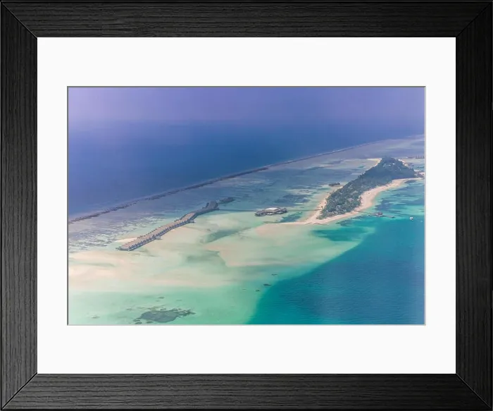 Framed Print : Aerial landscape of Maldives island beach. Tranquil tropical nature, coral reef and blue sea with sandbank. Luxury travel and holiday concept Framed Print : Aerial landscape of Maldives island beach. Tranquil tropical nature, coral reef and blue sea with sandbank. Luxury travel and holiday concept