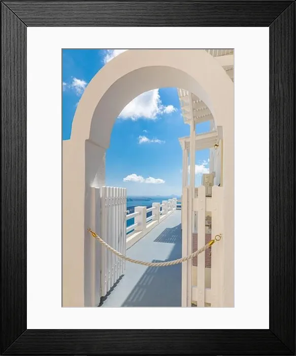 Framed Print : Blue sky with white gate and beautiful sea view. Amazing caldera with white architecture. Luxury summer travel and romantic vacation destination mood Framed Print : Blue sky with white gate and beautiful sea view. Amazing caldera with white architecture. Luxury summer travel and romantic vacation destination mood