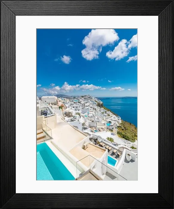 Framed Print : Beautiful white caldera view of Santorini in Greece. Luxury hotel resort pool over white architecture and sea view, blue sky. Summer travel vacation Framed Print : Beautiful white caldera view of Santorini in Greece. Luxury hotel resort pool over white architecture and sea view, blue sky. Summer travel vacation