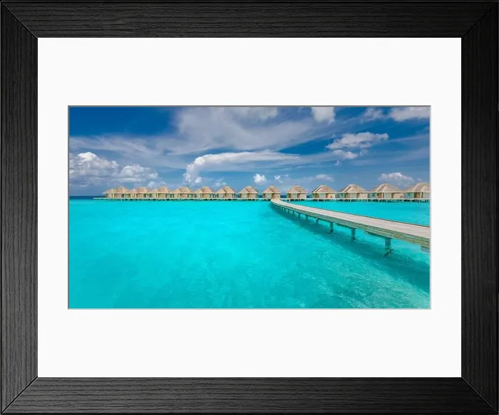 Framed Print : Panoramic landscape of Maldives beach. Tropical panorama, luxury water villa resort with wooden pier or jetty. Luxury travel destination background Framed Print : Panoramic landscape of Maldives beach. Tropical panorama, luxury water villa resort with wooden pier or jetty. Luxury travel destination background