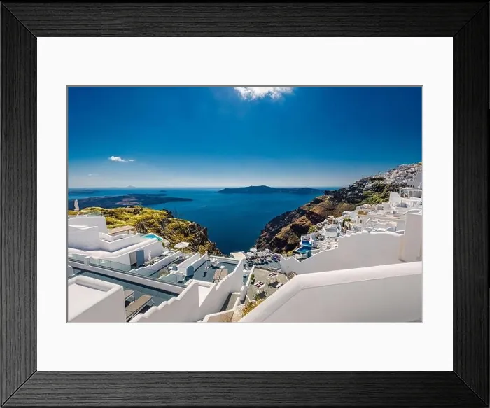 Framed Print : Santorini Island, filled with cafes and hotels overlooking the Aegean Sea and volcanic Caldera. Luxury summer travel and vacation destination of white Framed Print : Santorini Island, filled with cafes and hotels overlooking the Aegean Sea and volcanic Caldera. Luxury summer travel and vacation destination of white