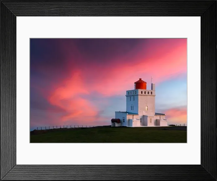 Framed Print : Amazing evening view of Dyrholaey Lighthouse at Cape Dyrholaey, south coast of Iceland. Great purple sunset glowing on background