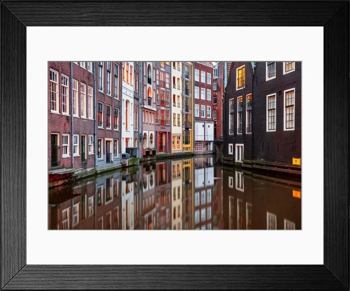 Framed Print : Amsterdam, Netherlands with narrow canals and buildings lining them in the morning time Framed Print : Amsterdam, Netherlands with narrow canals and buildings lining them in the morning time
