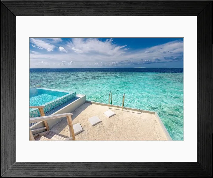 Framed Print : Infinity pool on the bright summer day. Infinity swimming pool in luxury hotel resort, tropical seascape, lagoon. Amazing summer vacation leisure view Framed Print : Infinity pool on the bright summer day. Infinity swimming pool in luxury hotel resort, tropical seascape, lagoon. Amazing summer vacation leisure view