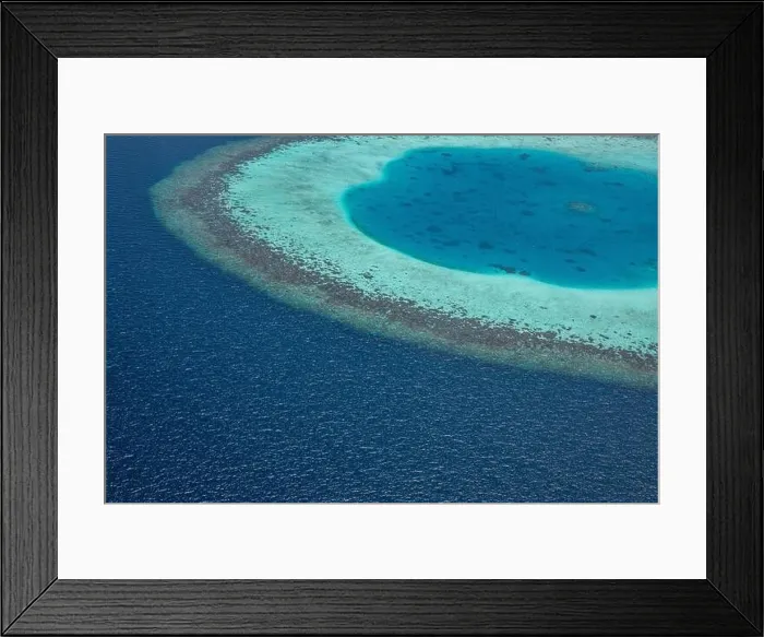 Framed Print : Beauty tropical island. Aerial view on tropical islands, drone, plane view from coral reef atoll in Maldives islands. Exotic travel nature destination Framed Print : Beauty tropical island. Aerial view on tropical islands, drone, plane view from coral reef atoll in Maldives islands. Exotic travel nature destination