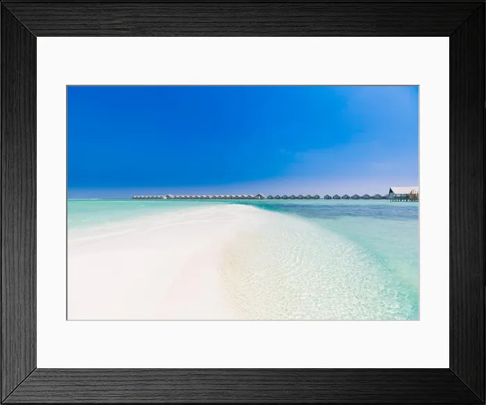 Framed Print : Maldives paradise beach, water villas, wooden jetty. Moody blue sky and blue lagoon. Luxury tourism and travel, tranquil sea with horizon Framed Print : Maldives paradise beach, water villas, wooden jetty. Moody blue sky and blue lagoon. Luxury tourism and travel, tranquil sea with horizon