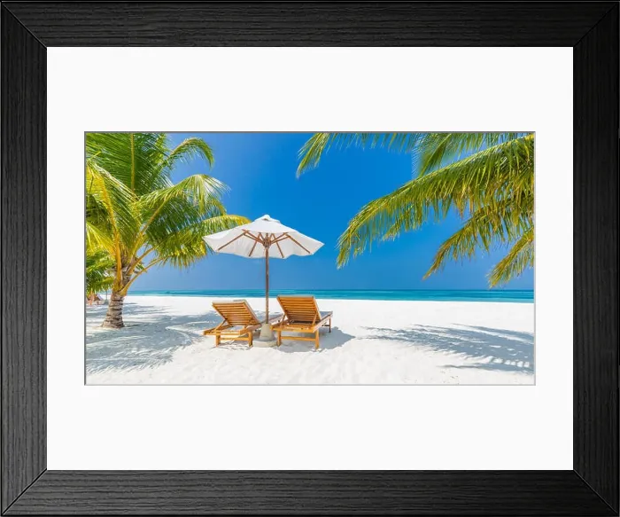 Framed Print : Perfect beach panorama, palms two sun beds and umbrella near the sea, idyllic beach scene. Tropical vacation and beach resort holiday banner concept Framed Print : Perfect beach panorama, palms two sun beds and umbrella near the sea, idyllic beach scene. Tropical vacation and beach resort holiday banner concept
