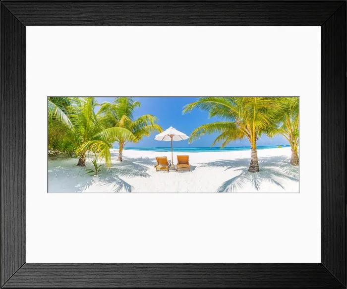 Framed Print : Perfect beach panorama, palms two sun beds and umbrella near the sea, idyllic beach scene. Tropical vacation and beach resort holiday banner concept Framed Print : Perfect beach panorama, palms two sun beds and umbrella near the sea, idyllic beach scene. Tropical vacation and beach resort holiday banner concept