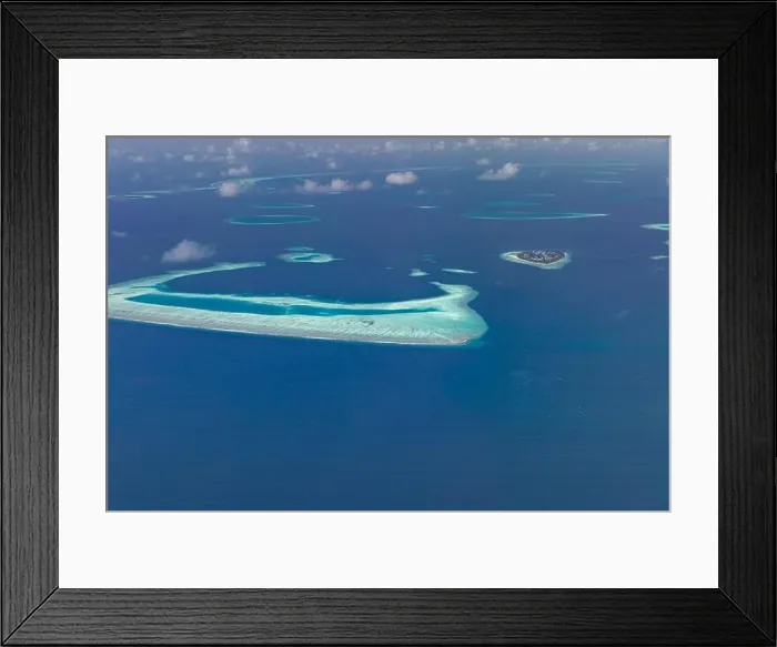 Framed Print : Beauty tropical island. Aerial view on tropical islands, drone, plane view from coral reef atoll in Maldives islands. Exotic travel nature destination Framed Print : Beauty tropical island. Aerial view on tropical islands, drone, plane view from coral reef atoll in Maldives islands. Exotic travel nature destination