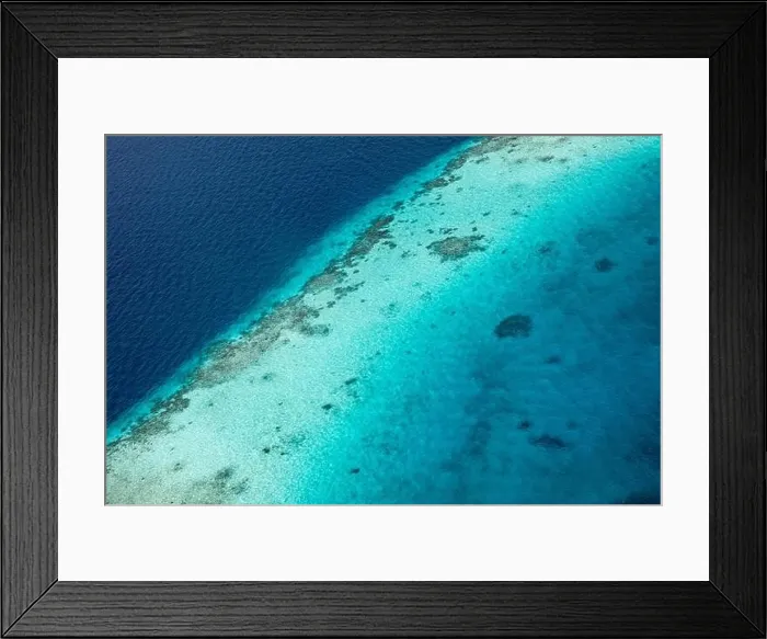 Framed Print : Beauty tropical island. Aerial view on tropical islands, drone, plane view from coral reef atoll in Maldives islands. Exotic travel nature destination Framed Print : Beauty tropical island. Aerial view on tropical islands, drone, plane view from coral reef atoll in Maldives islands. Exotic travel nature destination