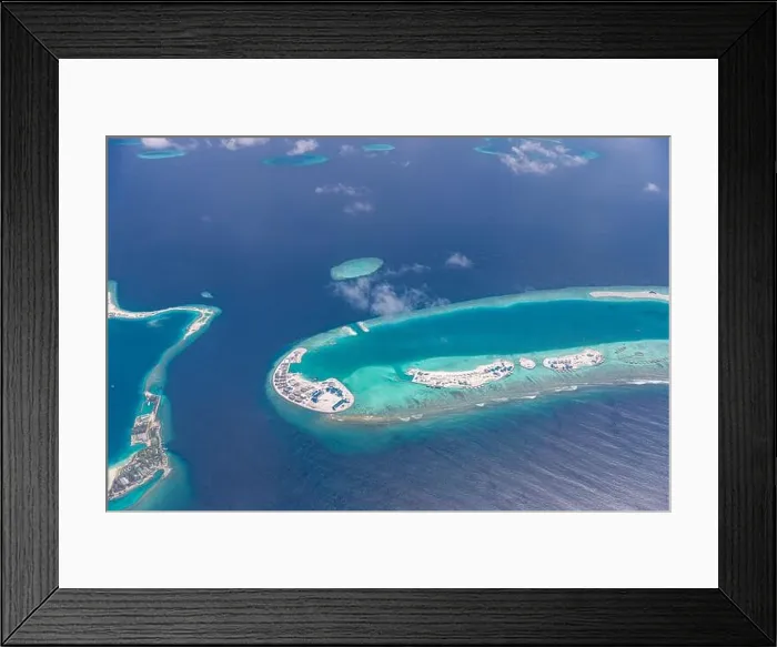 Framed Print : Beauty tropical island. Aerial view on tropical islands, drone, plane view from coral reef atoll in Maldives islands. Exotic travel nature destination Framed Print : Beauty tropical island. Aerial view on tropical islands, drone, plane view from coral reef atoll in Maldives islands. Exotic travel nature destination