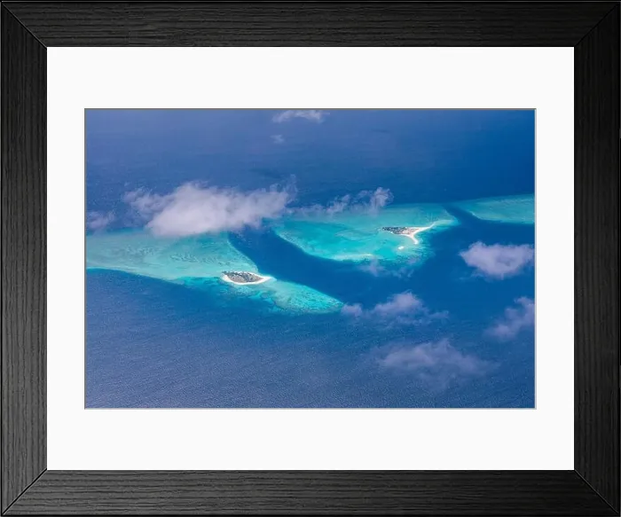 Framed Print : Beauty tropical island. Aerial view on tropical islands, drone, plane view from coral reef atoll in Maldives islands. Exotic travel nature destination Framed Print : Beauty tropical island. Aerial view on tropical islands, drone, plane view from coral reef atoll in Maldives islands. Exotic travel nature destination