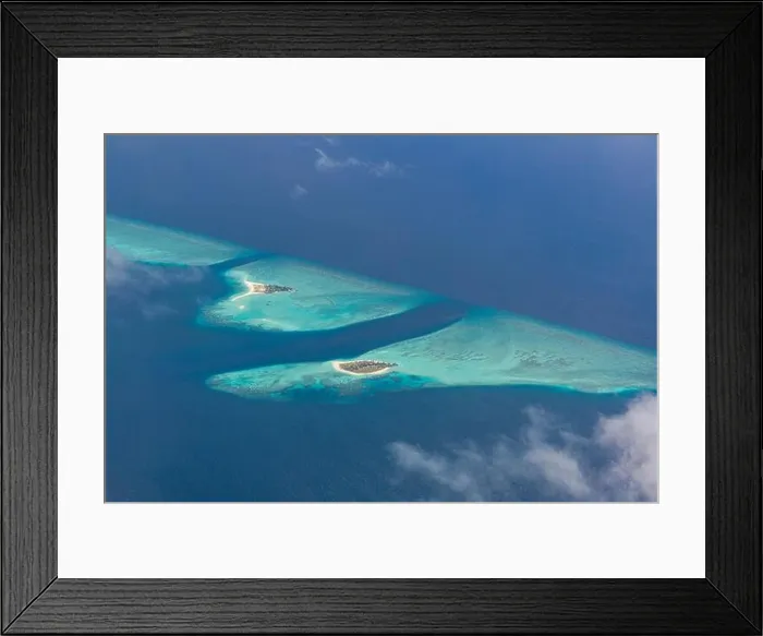 Framed Print : Beauty tropical island. Aerial view on tropical islands, drone, plane view from coral reef atoll in Maldives islands. Exotic travel nature destination Framed Print : Beauty tropical island. Aerial view on tropical islands, drone, plane view from coral reef atoll in Maldives islands. Exotic travel nature destination