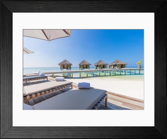 Framed Print : Luxury water villas in Maldives, tropical resort or hotel background. Exotic travel destination Framed Print : Luxury water villas in Maldives, tropical resort or hotel background. Exotic travel destination