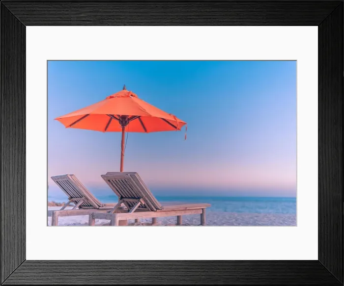 Framed Print : Perfect beach banner, two sun chairs and umbrella in tropical landscape. Tranquil exotic nature scenery. Luxury resort for summer vacation and holiday Framed Print : Perfect beach banner, two sun chairs and umbrella in tropical landscape. Tranquil exotic nature scenery. Luxury resort for summer vacation and holiday
