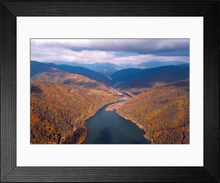 Framed Print : Aerial view on lake with turquoise water in Carpathian Mountains. Autumn forest with orange trees on coast Framed Print : Aerial view on lake with turquoise water in Carpathian Mountains. Autumn forest with orange trees on coast