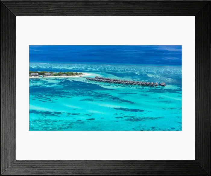 Framed Print : Aerial drone bird's eye view photo of Maldives island and sea. Beautiful turquoise and sapphire clear water beach. Exotic vacation from seaplane view Framed Print : Aerial drone bird's eye view photo of Maldives island and sea. Beautiful turquoise and sapphire clear water beach. Exotic vacation from seaplane view