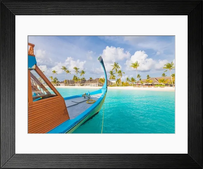 Framed Print : Inspirational Maldives island beach design. Maldives traditional boat Dhoni and perfect blue sea with lagoon. Luxury tropical paradise concept