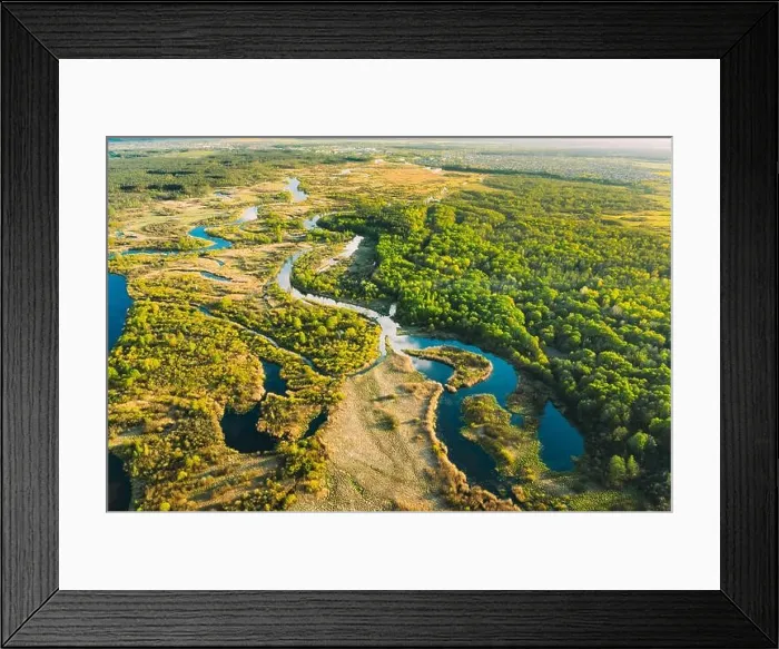 Framed Print : Aerial View Green Forest Woods And River Landscape In Sunny Spring Summer Day. Top View Of Beautiful European Nature From High Attitude In Autumn Framed Print : Aerial View Green Forest Woods And River Landscape In Sunny Spring Summer Day. Top View Of Beautiful European Nature From High Attitude In Autumn