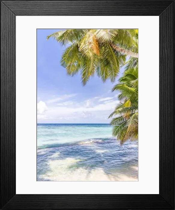 Framed Print : Tropical nature beach, palm tree leaves over exotic seascape with summer vibes. Dream travel vacation beach view, ocean horizon, idyllic scene Framed Print : Tropical nature beach, palm tree leaves over exotic seascape with summer vibes. Dream travel vacation beach view, ocean horizon, idyllic scene
