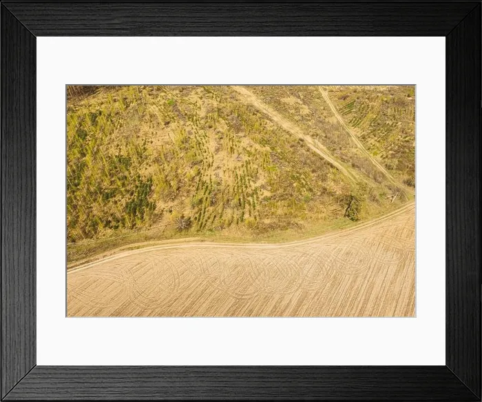 Framed Print : Aerial View Of Minimalistic Rural Landscape. Bird's-eye View Of Deforestation. Beginning Of Agricultural Spring Season. Tractor Tracks On Plowed Field Framed Print : Aerial View Of Minimalistic Rural Landscape. Bird's-eye View Of Deforestation. Beginning Of Agricultural Spring Season. Tractor Tracks On Plowed Field
