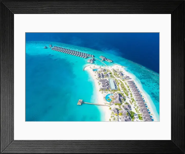 Framed Print : Atolls and islands in Maldives. Tropical island at Maldives with luxury water villas, bungalows over amazing blue sea. Summer vacation, aerial view Framed Print : Atolls and islands in Maldives. Tropical island at Maldives with luxury water villas, bungalows over amazing blue sea. Summer vacation, aerial view