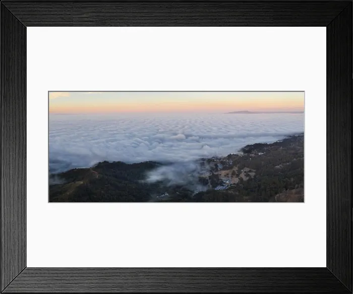 Framed Print : The marine layer, a moist air mass that develops over the ocean in the presence of a temperature inversion, seeps over the Bay Area in California Framed Print : The marine layer, a moist air mass that develops over the ocean in the presence of a temperature inversion, seeps over the Bay Area in California