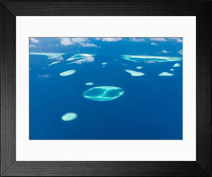 Framed Print : Aerial view on tropical islands. Aerial photo of beautiful paradise Maldives tropical beach on island. Summer and holiday and travel vacation Framed Print : Aerial view on tropical islands. Aerial photo of beautiful paradise Maldives tropical beach on island. Summer and holiday and travel vacation