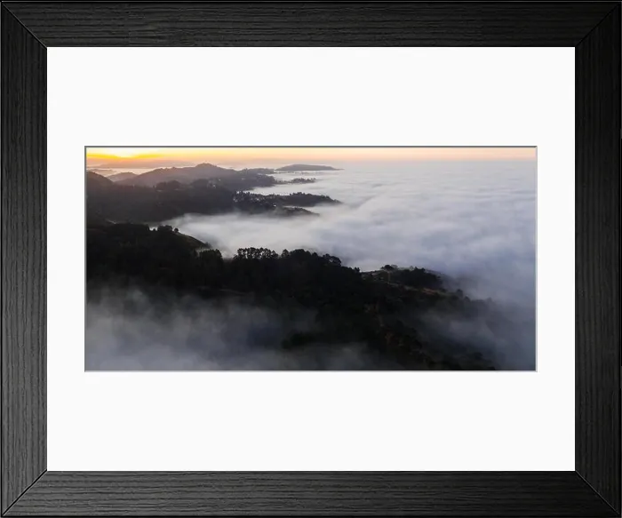 Framed Print : The marine layer, a moist air mass developing over the Pacific in the presence of a temperature inversion, seeps over the San Francisco Bay Area Framed Print : The marine layer, a moist air mass developing over the Pacific in the presence of a temperature inversion, seeps over the San Francisco Bay Area