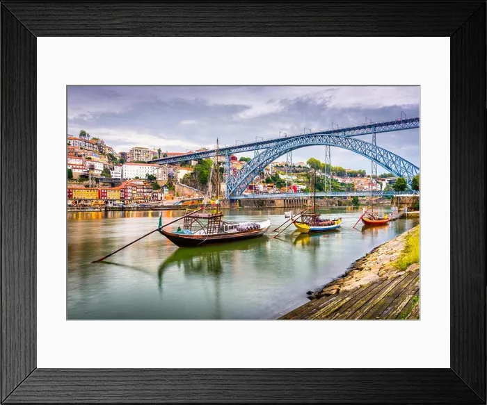 Framed Print : Porto, Portugal town view on the Douro River in the early evening Framed Print : Porto, Portugal town view on the Douro River in the early evening