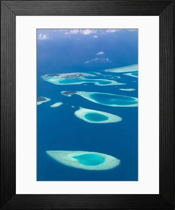 Framed Print : Aerial view on tropical islands. Aerial photo of beautiful paradise Maldives tropical beach on island. Summer and holiday and travel vacation Framed Print : Aerial view on tropical islands. Aerial photo of beautiful paradise Maldives tropical beach on island. Summer and holiday and travel vacation