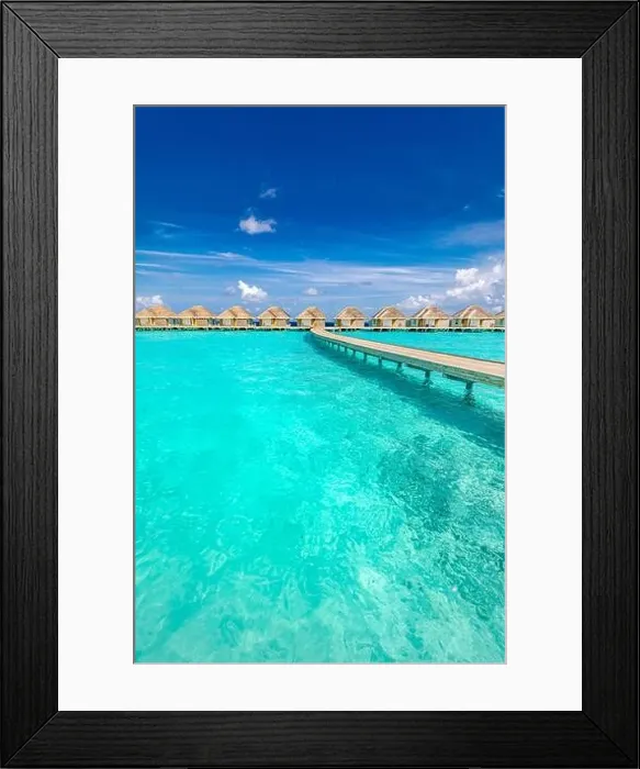 Framed Print : Tropical Maldives island with coconut palm tree, wooden bridge and water villa. Exotic travel landscape. Beautiful summer island paradise, peaceful Framed Print : Tropical Maldives island with coconut palm tree, wooden bridge and water villa. Exotic travel landscape. Beautiful summer island paradise, peaceful