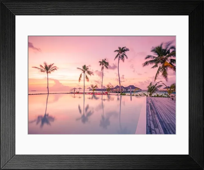 Framed Print : Luxury resort beach. Beautiful poolside and sunset sky. Luxurious tropical beach landscape, deck chairs and loungers infinity pool water reflection Framed Print : Luxury resort beach. Beautiful poolside and sunset sky. Luxurious tropical beach landscape, deck chairs and loungers infinity pool water reflection