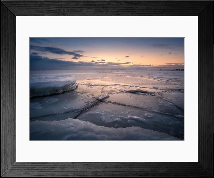 Framed Print : Scenic winter landscape with frosty sea and sunset at evening in Helsinki, Finland Framed Print : Scenic winter landscape with frosty sea and sunset at evening in Helsinki, Finland