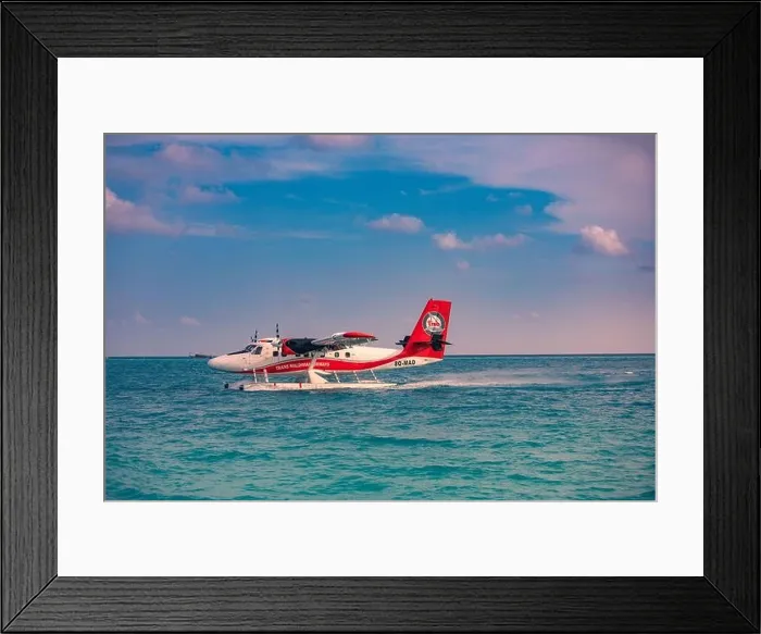 Framed Print : 05.06.2019 - Ari Atoll, Maldives: Exotic scene with seaplane on Maldives sea landing. Vacation holiday in Maldives concept background. Seaplane taxi Framed Print : 05.06.2019 - Ari Atoll, Maldives: Exotic scene with seaplane on Maldives sea landing. Vacation holiday in Maldives concept background. Seaplane taxi
