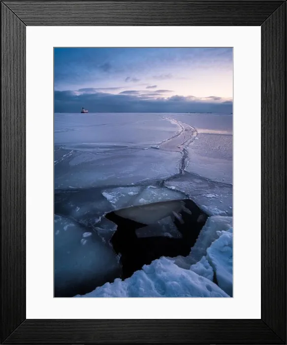 Framed Print : Scenic winter landscape with cruise and sunset at cold evening in Helsinki, Finland Framed Print : Scenic winter landscape with cruise and sunset at cold evening in Helsinki, Finland