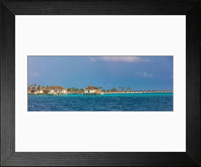Framed Print : Overwater bungalows at Maldives island. Luxury summer travel vacation destination. Exotic island, sea lagoon, water villas Framed Print : Overwater bungalows at Maldives island. Luxury summer travel vacation destination. Exotic island, sea lagoon, water villas