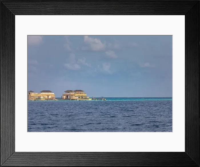 Framed Print : Overwater bungalows at Maldives island. Luxury summer travel vacation destination. Exotic island, sea lagoon, water villas