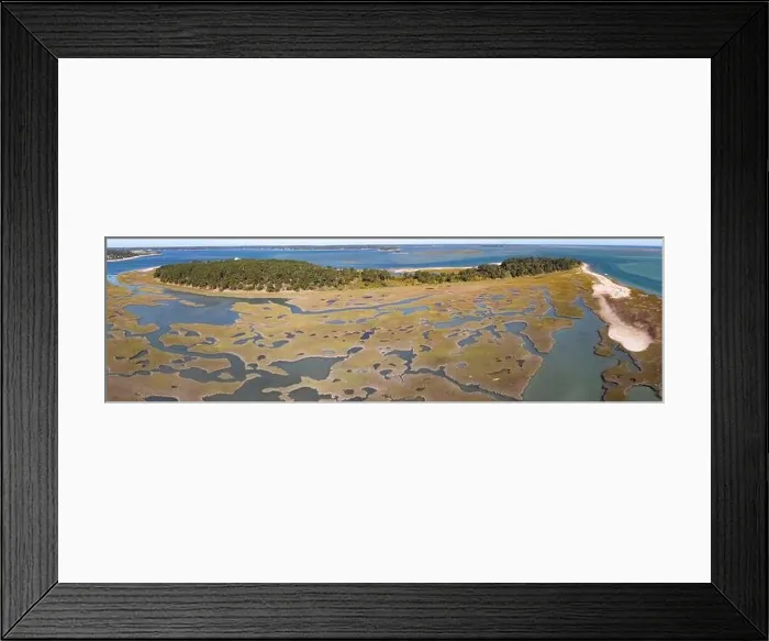 Framed Print : Channels meander through a salt marsh in Pleasant Bay, Cape Cod, Massachusetts. This type of wetland habitat is vital feeding grounds for wildlife Framed Print : Channels meander through a salt marsh in Pleasant Bay, Cape Cod, Massachusetts. This type of wetland habitat is vital feeding grounds for wildlife