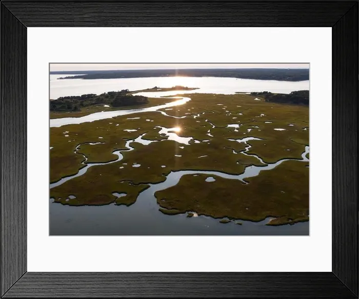 Framed Print : Channels meander through a salt marsh in Pleasant Bay, Cape Cod, Massachusetts. This wetland habitat is feeding grounds for birds, fish, and inverts Framed Print : Channels meander through a salt marsh in Pleasant Bay, Cape Cod, Massachusetts. This wetland habitat is feeding grounds for birds, fish, and inverts