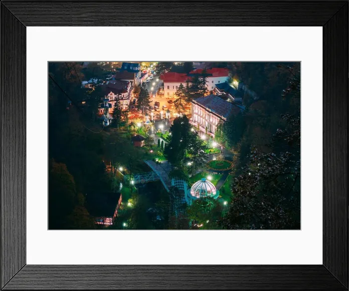 Framed Print : Borjomi, Samtskhe-Javakheti, Georgia. Aerial View Borjomi Cityscape And Central Park In Autumn October Evening Night In Night Illuminations Lights Lig Framed Print : Borjomi, Samtskhe-Javakheti, Georgia. Aerial View Borjomi Cityscape And Central Park In Autumn October Evening Night In Night Illuminations Lights Lig