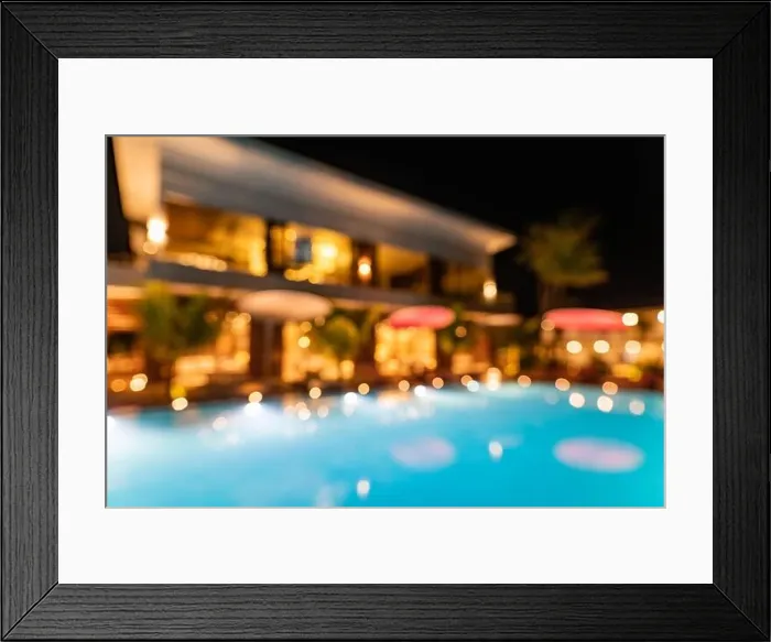 Framed Print : Blur lights reflection in infinity swimming luxury pool party water at night background. Resort hotel abstract bokeh background summer travel vacation Framed Print : Blur lights reflection in infinity swimming luxury pool party water at night background. Resort hotel abstract bokeh background summer travel vacation