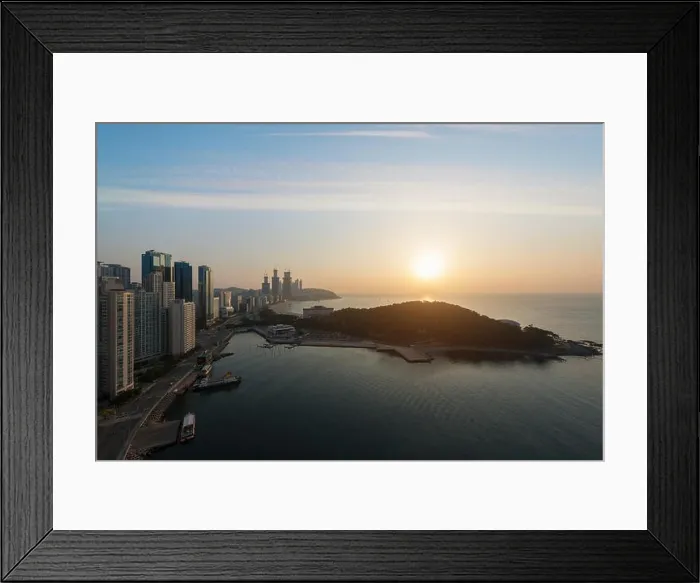 Framed Print : Sunrise at Haeundae beach in Busan. Haeundae beach is Busan's most popular beach in South Korea