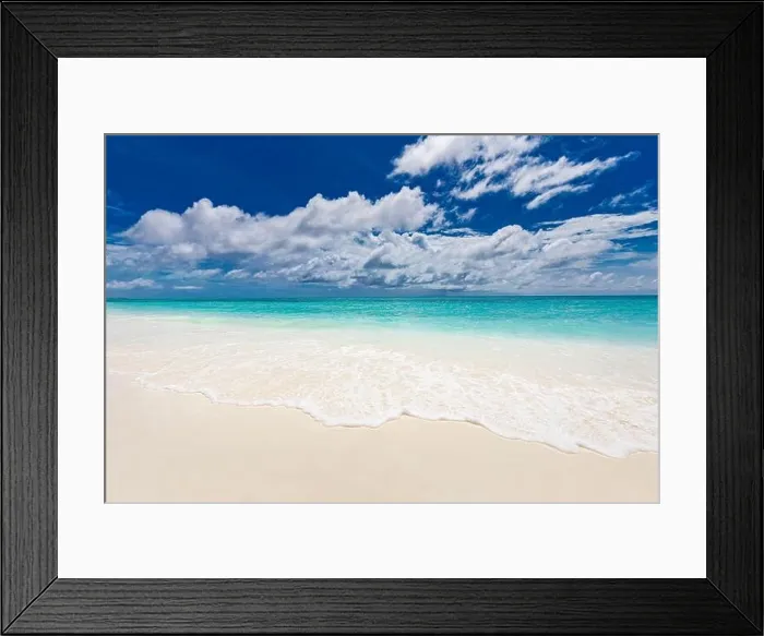Framed Print : Beach and tropical sea. Relaxing waves splashing with foam on soft white sand. Endless seascape and horizon. Calmness nature landscape under blue sky Framed Print : Beach and tropical sea. Relaxing waves splashing with foam on soft white sand. Endless seascape and horizon. Calmness nature landscape under blue sky