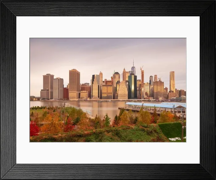 Framed Print : New York City skyline from across the East River with autumn seasonal foliage Framed Print : New York City skyline from across the East River with autumn seasonal foliage