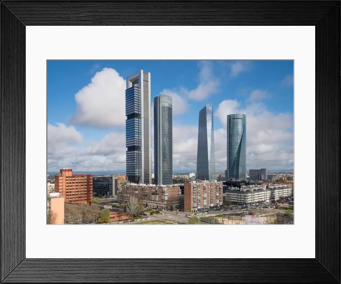 Framed Print : Madrid cityscape at daytime. Landscape of Madrid business building at Four Tower. Modern high building in business district area at Spain Framed Print : Madrid cityscape at daytime. Landscape of Madrid business building at Four Tower. Modern high building in business district area at Spain