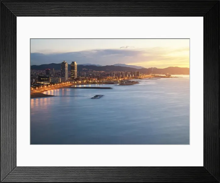 Framed Print : Aerial view of Barcelona Beach in summer night along seaside in Barcelona, Spain. Mediterranean Sea in Spain Framed Print : Aerial view of Barcelona Beach in summer night along seaside in Barcelona, Spain. Mediterranean Sea in Spain