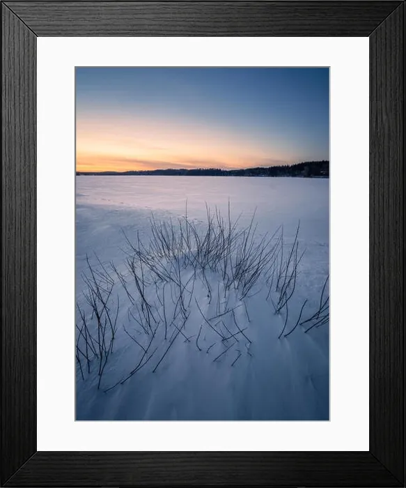 Framed Print : Beautiful winter landscape with snow and sunset at evening in Finland Framed Print : Beautiful winter landscape with snow and sunset at evening in Finland