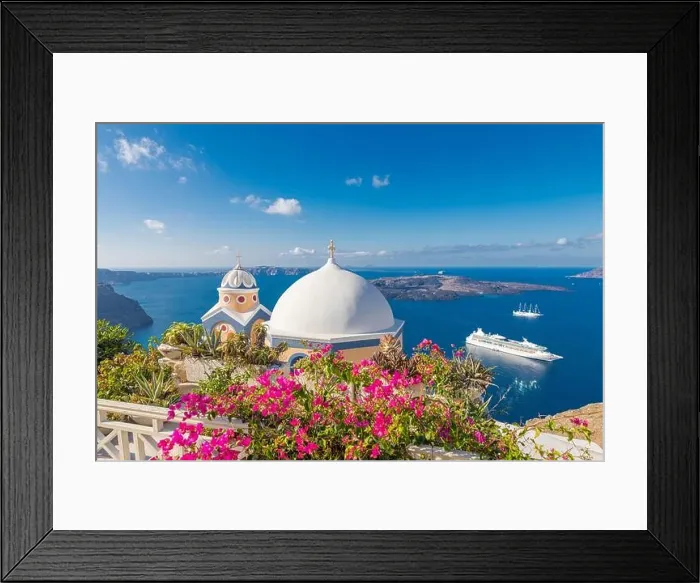 Framed Print : Scenic view of traditional cycladic houses with flowers in foreground, Oia village, Santorini, Greece. Summer travel landscape, sea view. Amazing Framed Print : Scenic view of traditional cycladic houses with flowers in foreground, Oia village, Santorini, Greece. Summer travel landscape, sea view. Amazing